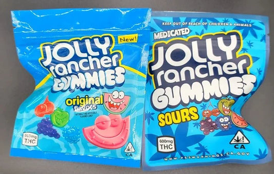 Packages of Jolly Rancher Gummies, original and medicated sours flavors with 600mg THC, blue packaging