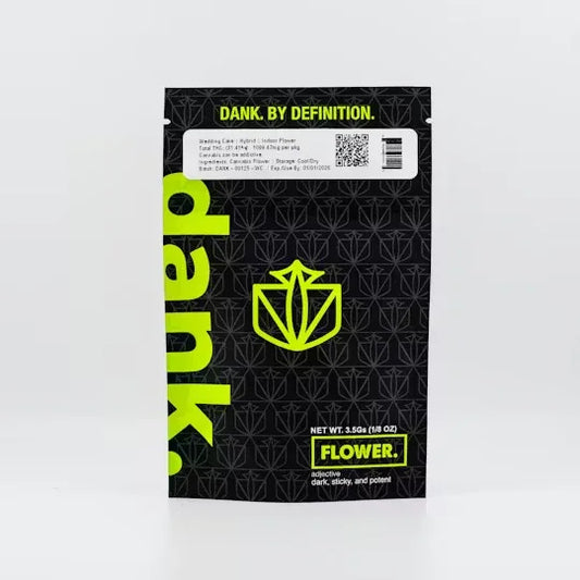 Black and green Dank cannabis flower packaging with bold logo and slogan 'Dank. By Definition.'