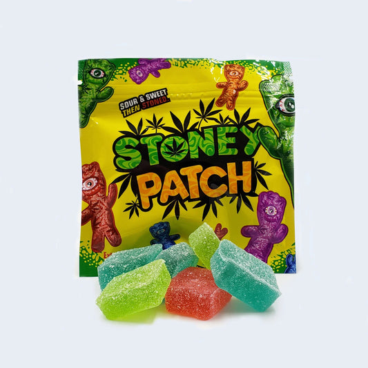 Stoney Patch sour and sweet cannabis edibles with colorful sour gummy pieces in front